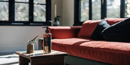 Room spray on a wood table in a modern living room